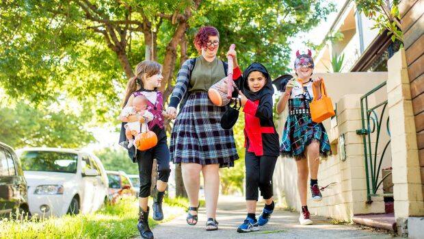 Tiffany Basili, her daughter Samara and friends George and Maia ready for Halloween in 2015. Photo: Cole Bennetts/Sydney Morning Herald