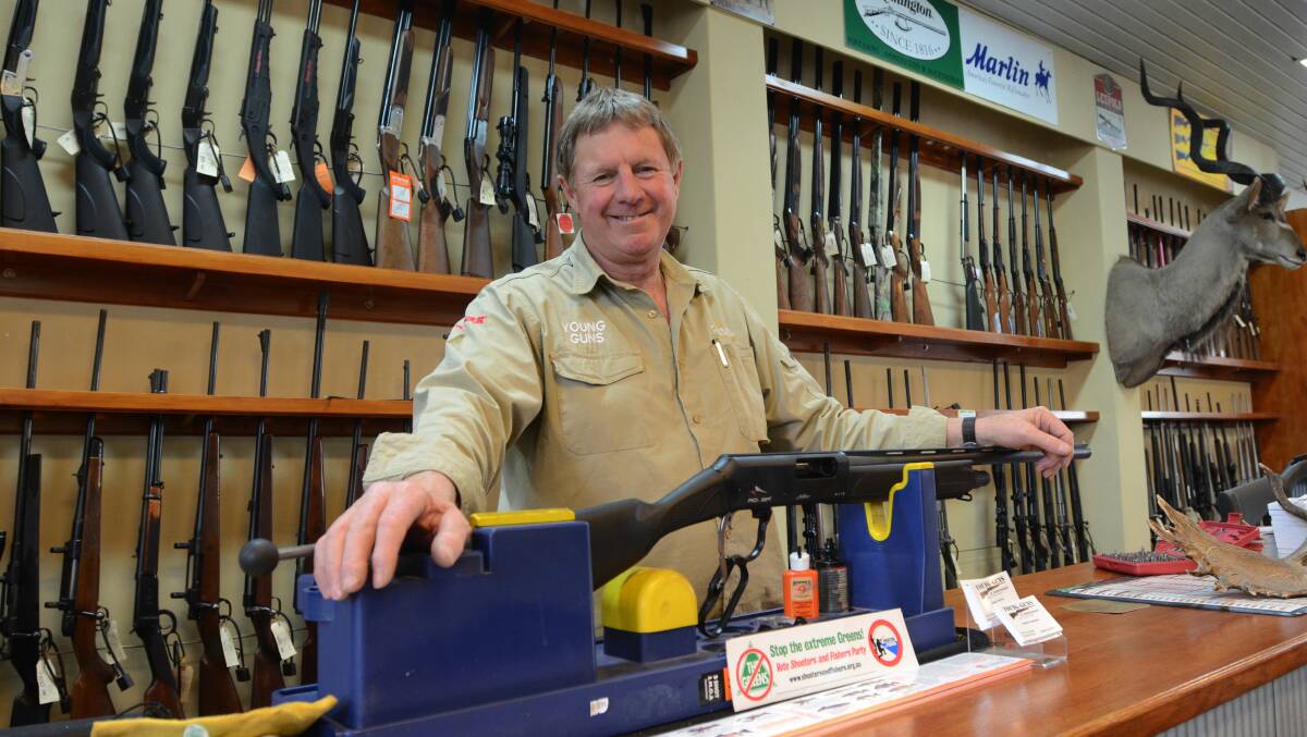 FRONT LINE: Owner of Young Guns and Ammo Graham Jamieson with a five-shot Adler shotgun. Picture: Elouise Hawkey. 