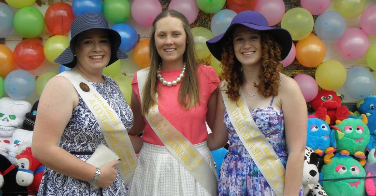 SHOWGIRL entrants (from left) Lucy Collingridge, Lucy McGlynn and Keira White in sideshow alley at last year's Cootamundra Show.