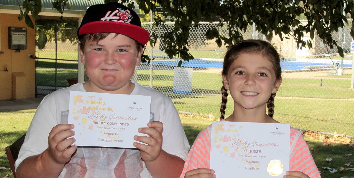 BUSH POETS: Sacred Heart Central School students Charly Thompson and Lilly Deep both did well in the primary category of the poetry competition at the Jugiong Writers' Festival. Picture: Kelly Manwaring