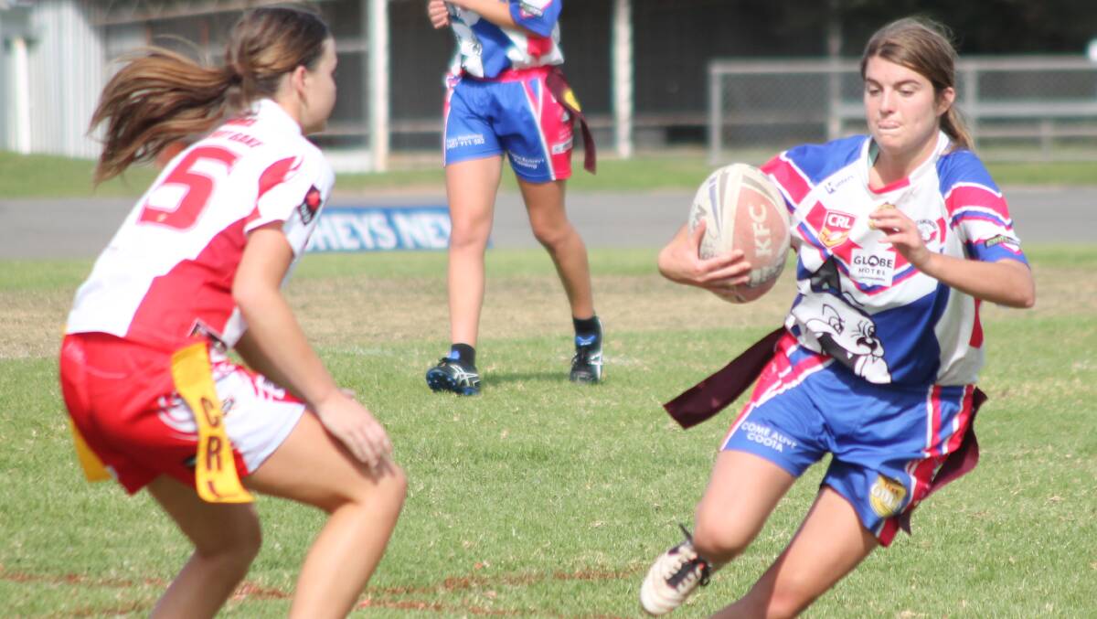 SWERVE: Lily Hogan puts a move on her marker during the Bullettes' narrow loss to the Temora Dragons in May. Picture: Harrison Vesey