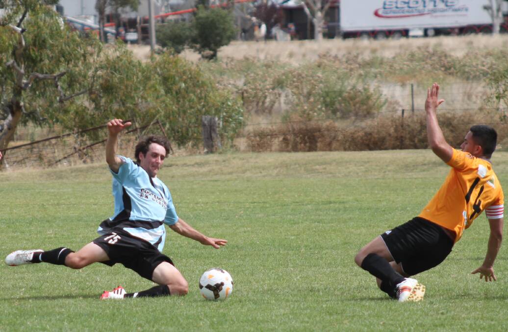 Derek Krogh gets down and dirty on Saturday claiming the possession for the Cootamundra Strikers.