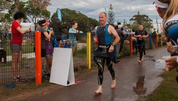 TOP EFFORT: Pat Drew completed a full marathon distance of 42km as part of the Port Macquarie ironman event last month. Picture: Contributed 