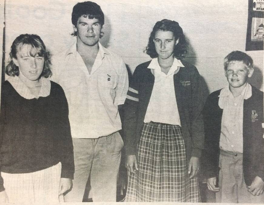 PAST: Cootamundra High School students Karen Barrett, Andrew Whitton, Jayne Barrett and Matthew Darling in the Herald in 1987 on their way to state swimming.