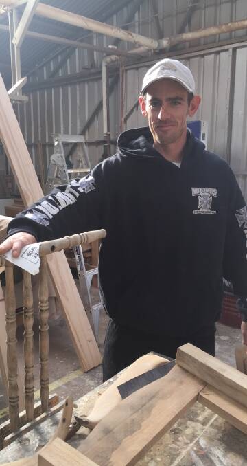 MENS SHED: Josh Crawford is in the process of restoring an antique chair. The Cootamundra Men’s Shed welcomes men of all ages to join the group.