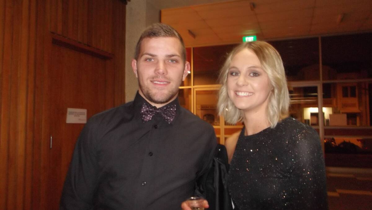 ALL DRESSED UP: Also present at the Blue and White Ball was rugby league player Ryan Miller together with Renae Glanville.