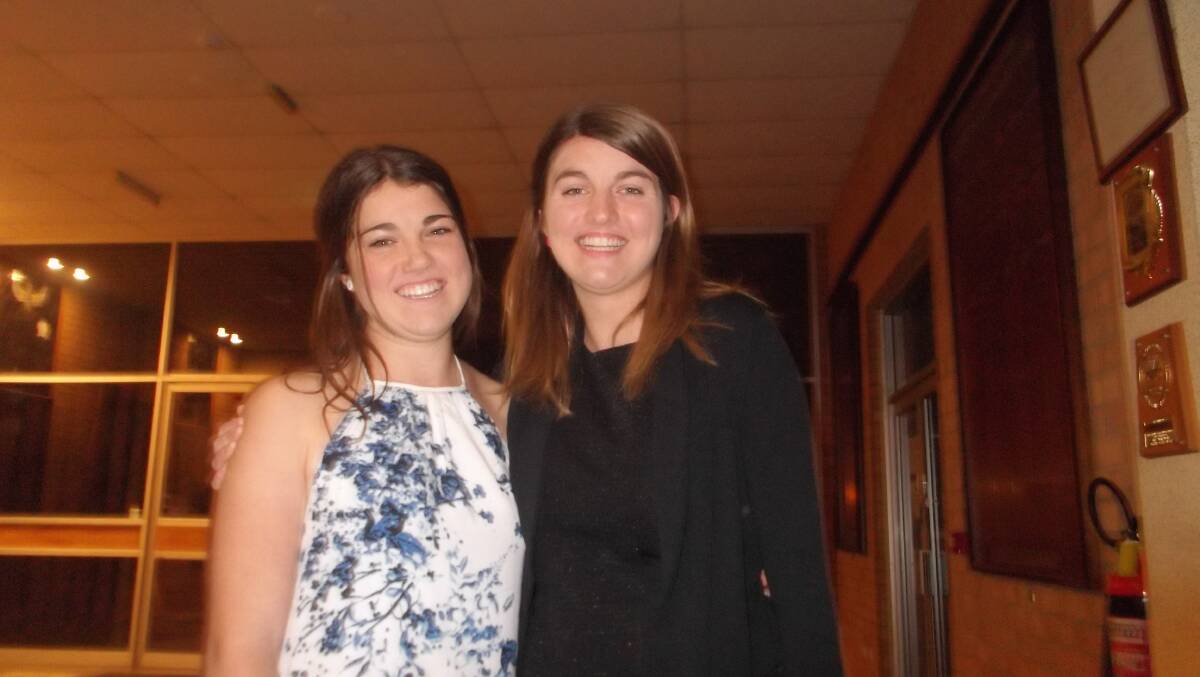 TOP-NOTCH NIGHT OUT: Enjoying catch up time at the Blue and White Ball are sisters Lilly and Kelsey Hogan.