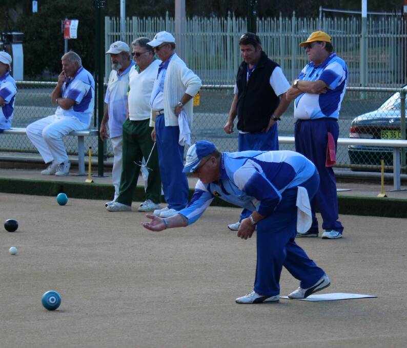 SEND IT DOWN: Steve Stanton keeps his eyes on the prize for Ex-Services Bowling Club at the weekend. Pictures: Contributed