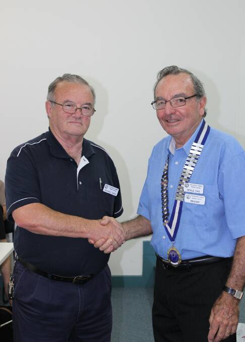 WELCOME: President Nevile Cave inducting Richard Cairns.
