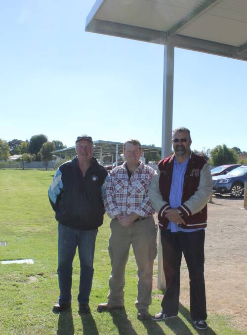 Cootamundra Strikers Soccer Club stalwarts president James Philpott (centre), grounds development officer David Clarke (left) and grants officer Gerry O’Brien stand proudly beneath the shelter erected at the canteen and dressing shed area. A further shade shelter was also erected for spectators.