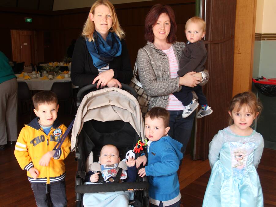 LUNCHING OUT: These young mums took their littlies to the Daffodil Tea - Gemma Sutherland with sons Eamon, Archer and Leo, Emma Damirchi with Nicholas and Sofia.
