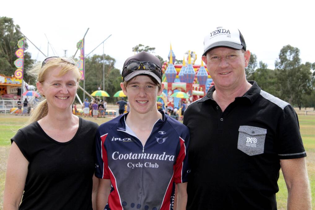 TOP DAY: Talented teenage rider for the Cootamundra Cycle Club Riley Sutcliffe with his parents Michelle and Bill at the Stock Fair following Sunday's race. Picture: Kelly Manwaring 