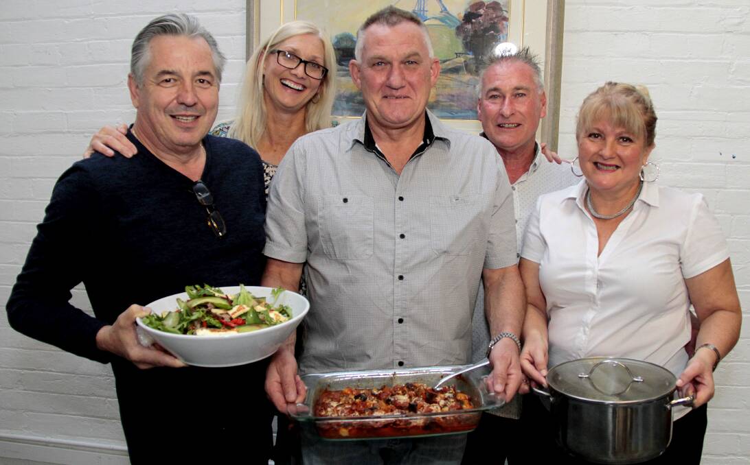 KEEPING IT LOCAL: Pictured with their home cooking at The Arts Centre are John Pacholski, Shari de Neef,  Peter O'Rourke, Peter and Fiona Alexander all of Coota. Picture: Kelly Manwaring