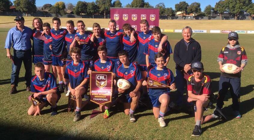 FANTASTIC EFFORT: Cootamundra’s Sacred Heart Central School under 16s rugby league team after taking out the Small Schools State Champions title. 