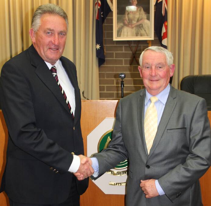 Cootamundra Shire Council deputy mayor Dennis Palmer (left) and mayor Jim Slattery following the election of their respective roles at a previous council meting. (The photo is a file photo from the Cootamundra Herald archive.) 