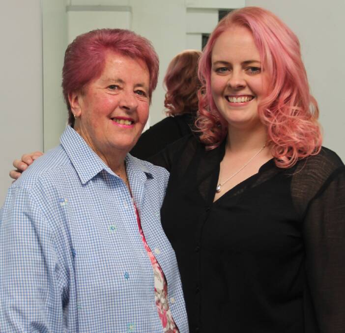 PRETTY IN PINK: Mari Jarvis and granddaughter Karlie Johnston with their newly pink hair thanks to La Faye in support of Breast Cancer Awareness Month.. Picture: Jennette Lees 