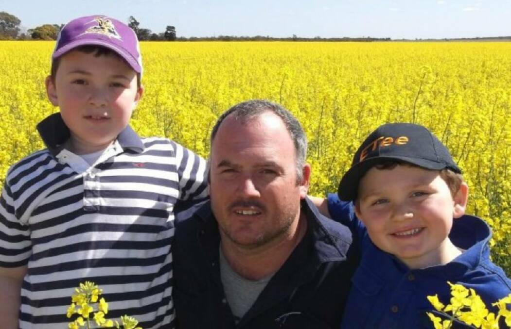 RUGBY MAD: Former Cootamundra Tricolours player Craig Randall with his gorgeous boys Angus and Oliver. Picture: Contributed 
