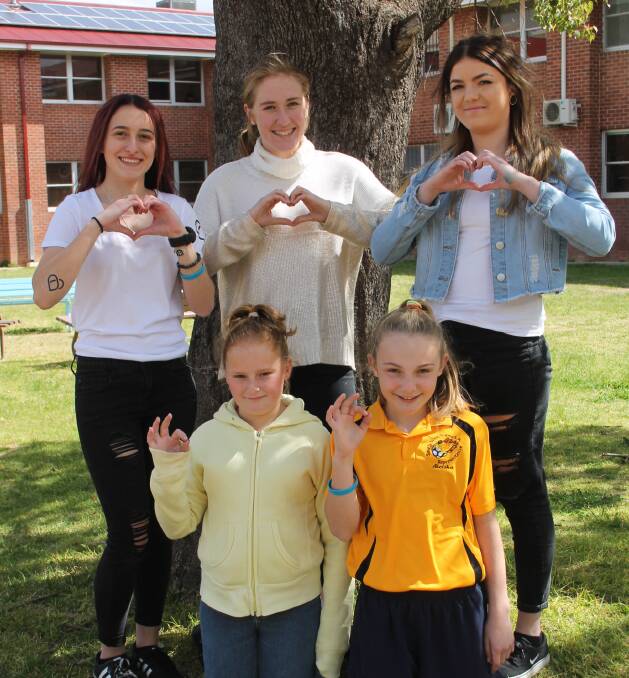 GOOD CAUSES: Tahlia Gatto, Louise Raleigh and Rebecca Pursey (front) Tori Craw-Reid and Aleisha Logue promote worthy causes. Picture: Jennette Lees 