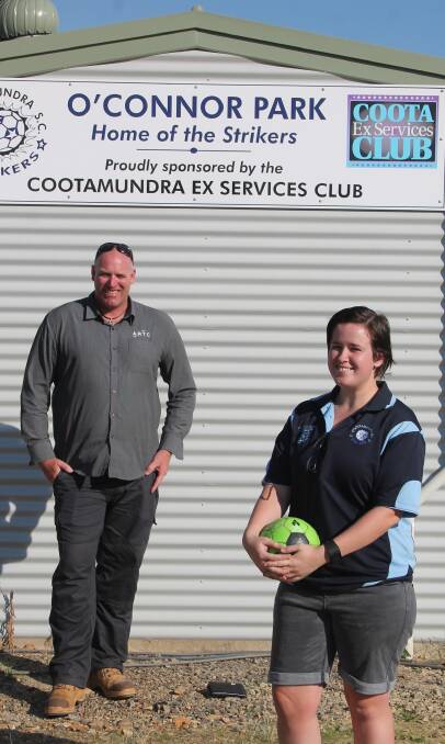 JUMP ON BOARD: Women's Strikers coach Mick Simons and player Kat Gould on a player recruitment driver to ensure a team can be fielded this year. Picture: Jennette Lees 