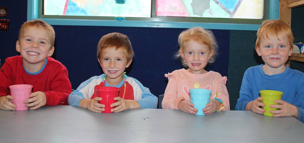 MILK MUSTACHES: Premier Early Learning's Kalen Lewis, Lucas Walker, Leilani McGlynn and Jacob Nalder are learning about where milk comes from. Picture: Jennette Lees 