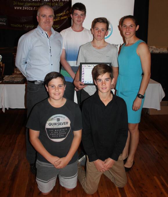PROUD: Coach Gerard Guthrie with players Nick Simons, Joe Ward, Nick Holt and Ben Rumble and guest speaker Nicole Begg. Picture: Jennette Lees 