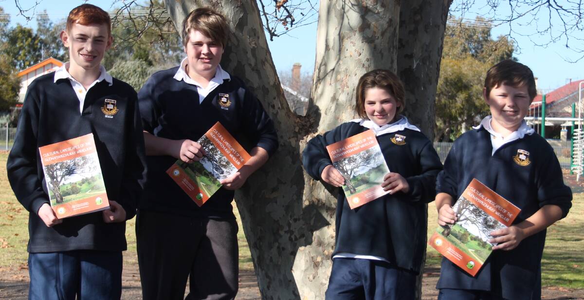 PUBLISHED AUTHORS: Blake Sloan, Brodie Jenkins, Alicia Harland and Bayley Derrick with the book they worked on for 12 months. Picture: Jennette Lees 