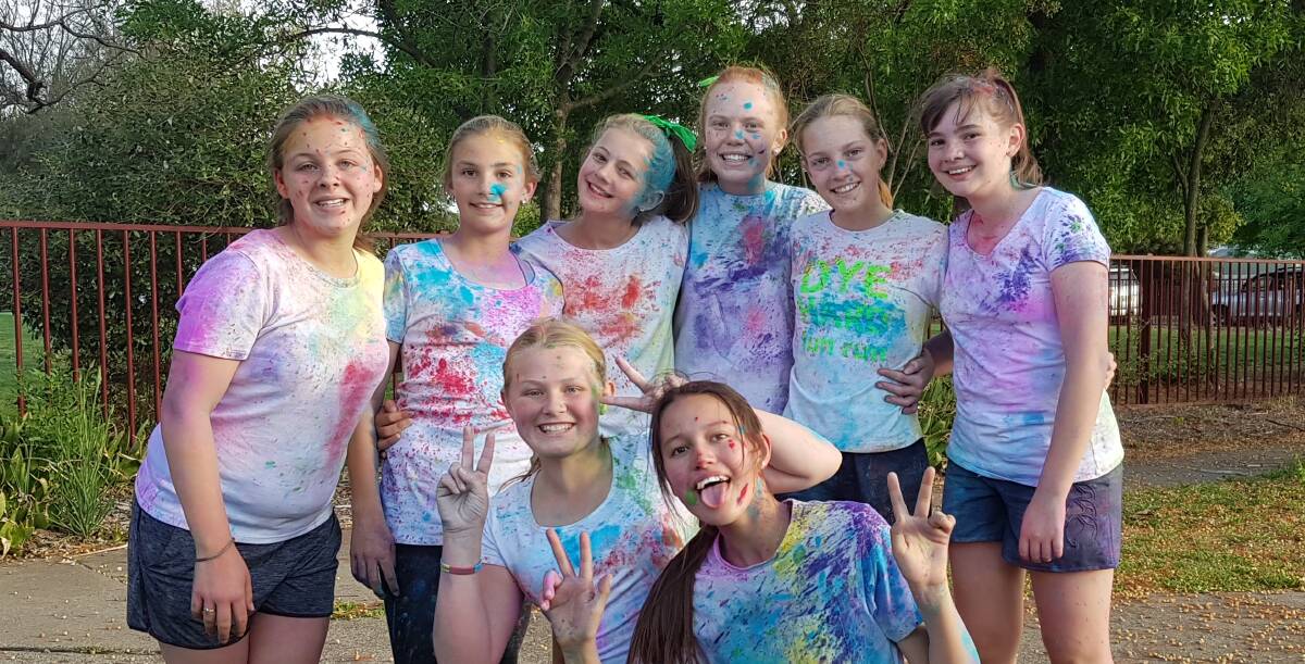 FRIENDS: This happy group of Year 7 students from Cootamundra High enjoyed the Sacred Heart Colour Run. Picture: Contributed 