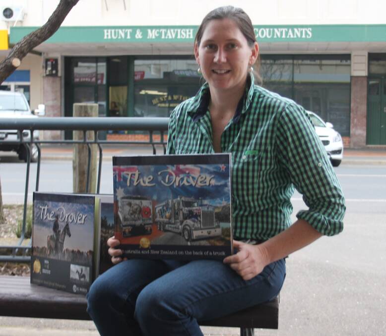 Alice Mabin in Cootamundra earlier this week with her two self-published books available from the Cootamundra Newsagency. Picture: Jennette Lees 