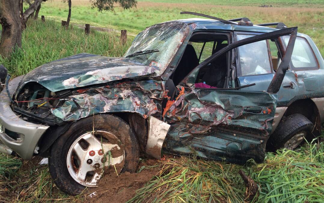CRASH: The wreck of a car after veering off the road at Wallendbeen on Thursday morning. Picture: Contributed 
