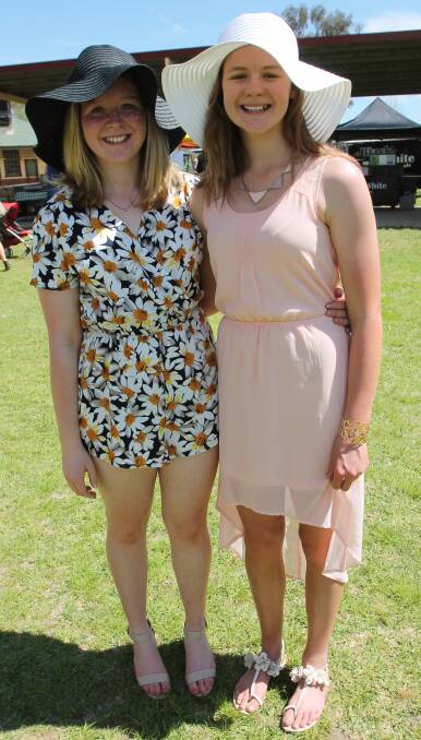 SUMMER FASHION: Sisters Emily and Michaela Webb looking beautiful at last year's Cootamundra Cup race meeting hosted by the Cootamundra Turf Club.
