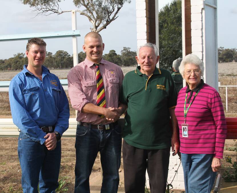 WITH THANKS: Southern District Picnic Races president Scott Adams and the Cootamundra Rugby Club's Joshua Hudson are pleased to support Can Assist represented by Neil Murray and Margie Large. Picture: Jennette Lees 