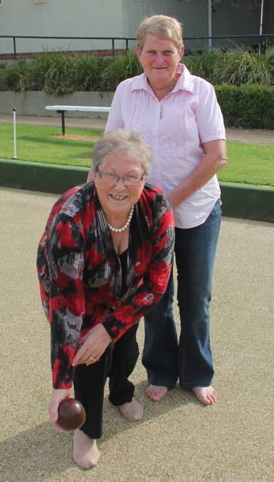 ALL SET: Barefoot bowls charity day co-organisers Helen Eccleston and Chris Delahunty kick off their shoes ahead of Sunday's event. Picture: Jennette Lees 