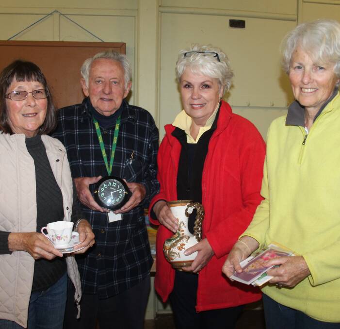 SOMETHING FOR EVERYONE: Can Assist volunteers Viv Christie, Neil Murray, Colleen Flynn and Marg Somers with some of the items available at this Saturday's sale. Picture: Jennette Lees 