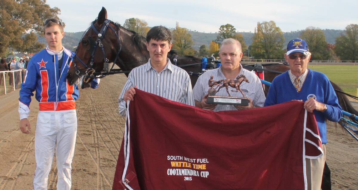 WINNING CONNECTION: Driver James Harding, Harness Club secretary Stephen Hunt, trainer Geoff Harding and Harness Club president Keith Boxsell.
