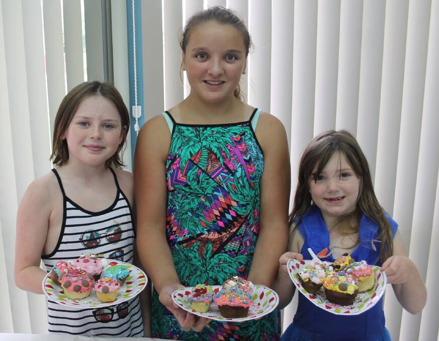 FUN TIMES: Josie Seaman, Amelia Chambers and Darcy Sheppard at the library last year. Again the library has a plethora of activities on offer. Picture: Jennette Lees 