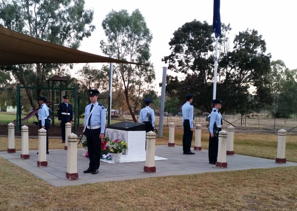 RESPECT: The catafalque party from the RAAF Base in Wagga stands to attention during Dawn Service in Bethungra on Monday. Picture: Contributed 