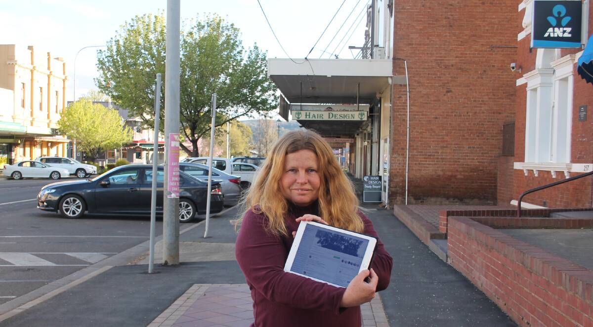 MAIN STREET FOCUS: Marie Scott only signed up to Facebook to join Cootamundra Remembers. A current member of the History Society, she is working with members to document the history of the main street. Picture: Jennette Lees 