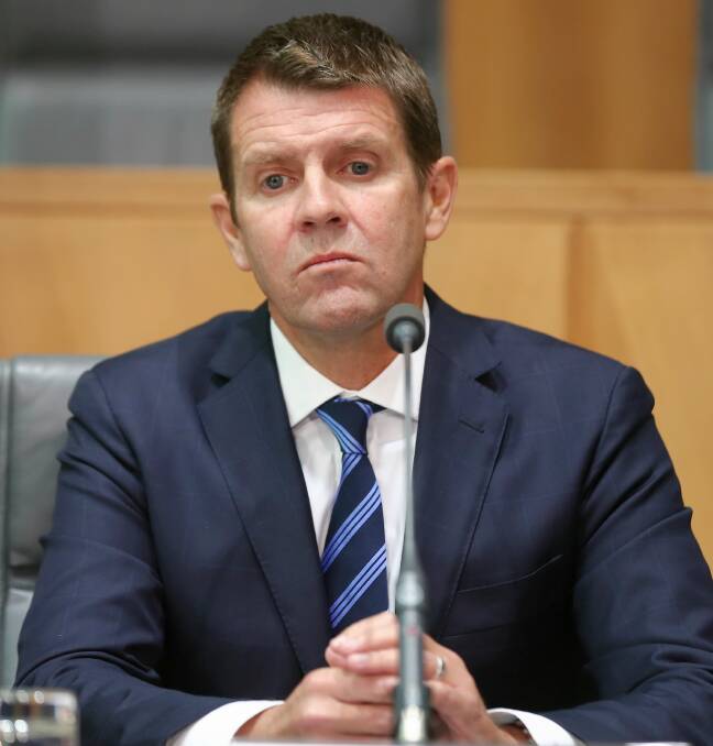NOT THE WAY TO GO: Letter writer Mitch McTavish is critical of the NSW Premier Mike Baird's (pictured) council amalgamation program.