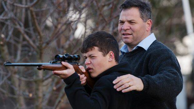 Shooters, Fishers and Farmers Party member, Phil Donato with 13-year-old son Sean. Photo: James Brickwood