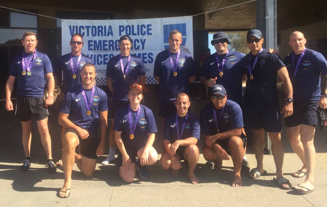 BLAZING A TRAIL: Cootamundra's Jessica Ashe (bottom row, second from left) was the first women to represent the Victoria Police in touch football. She will compete at the World Police and Fire Games in August.