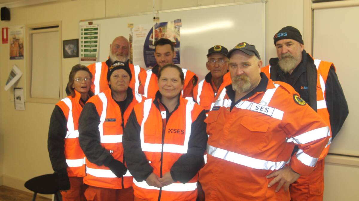 8 OUT OF 9 AIN'T BAD: Cootamundra SES Controller Des Rowe (back row, centre right) has bolstered his volunteer stocks and is calling for more locals to lend their support. Picture: Lachlan Grey
