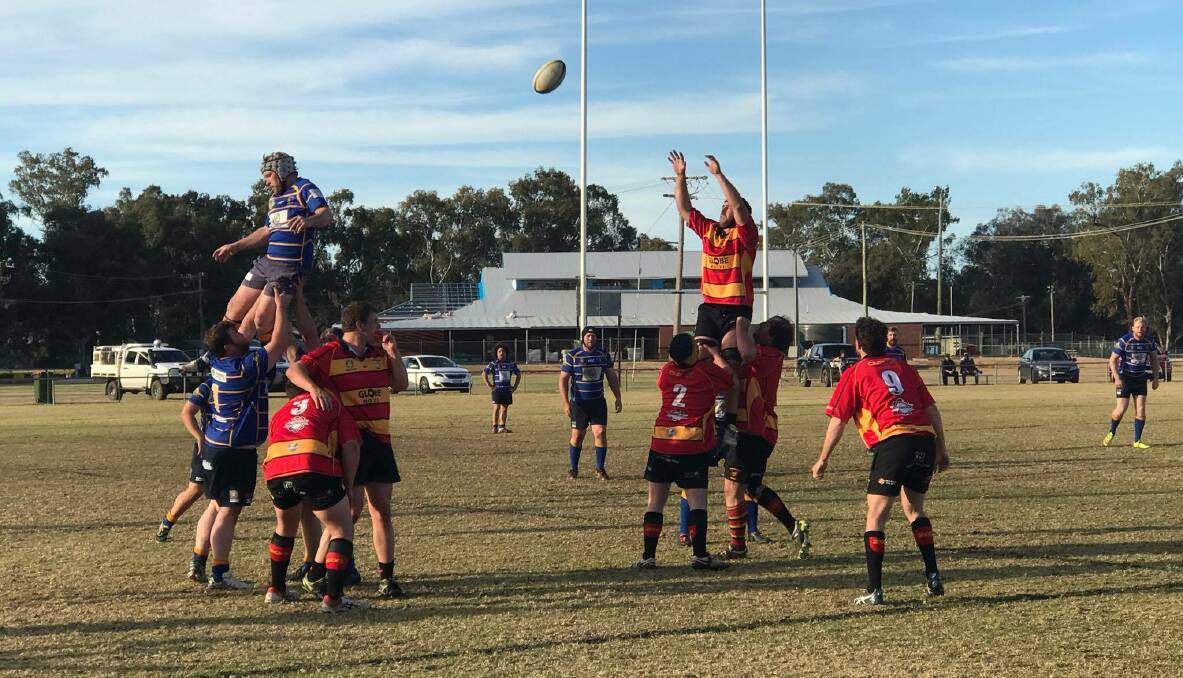 LIFT-OFF: Cootamundra's Issac Mitchell soars skyward during the Tricolours' 43-29 win over Condobolin on Saturday. The win secures Coota's finals berth. Picture: Lachlan Grey