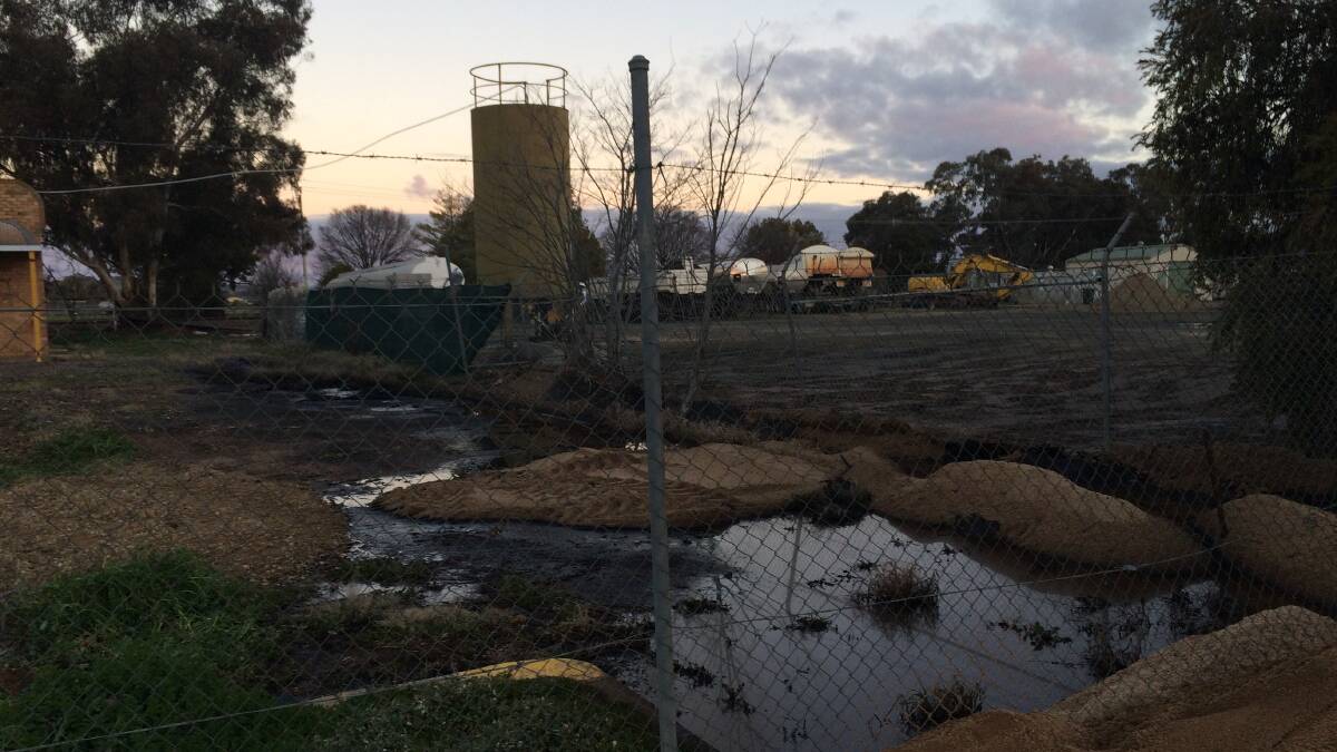LEAKED FOOTAGE: A spill from a waste management tank along Hovell Street reportedly burst earlier this week, sending up to 20,000L of waste liquid along council land and street property. Picture: Lachlan Grey 