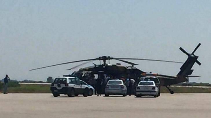 A Blackhawk military helicopter carrying seven Turkish military personnel and one civilian at the Alexandroupolis airport in northeastern Greece. The eight occupants asked for asylum, according to Greece's defence ministry.