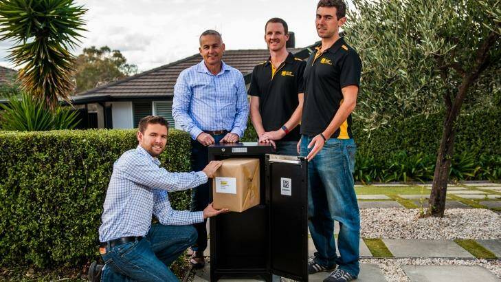 Queanbeyan company, Smart Delivery Systems Chief Operating Officer Gordon Campbell, national BDM and marketing manager Norm Poulos, design manager Andrew Elliott and system engineer Tom Shafron launch this week with permanent lockers that become part of your letter box and collect mail for you so you don't have to go to the post office to get parcels. Photo: Elesa Kurtz