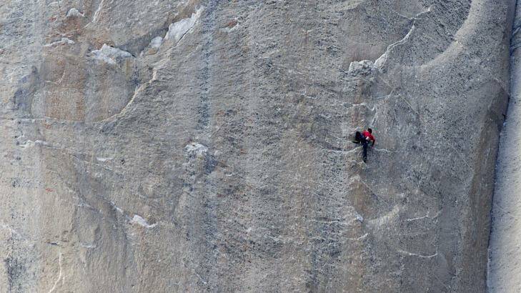Kevin Jorgeson climbs up the Dawn Wall of El Capitan in California's Yosemite National Park. Photo: AP/Tom Evans
