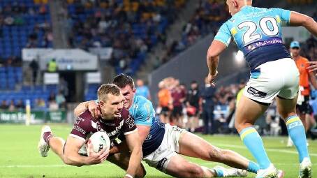 Tom Trbojevic had an unusually sloppy night but still scored twice as Manly saw off the Titans. (Jason O'BRIEN/AAP PHOTOS)
