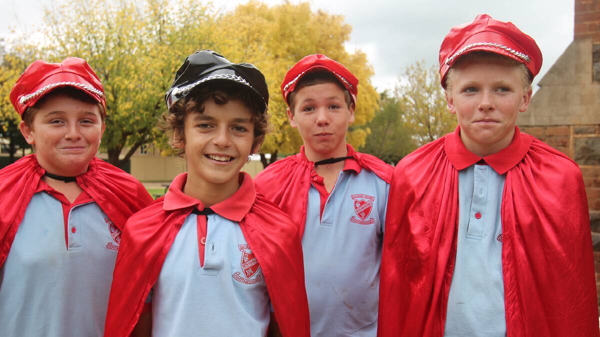 COOTAMUNDRA: Pictured rehearsing for their school play this week were Cootamundra Sacred Heart Central School students (from left) Dylan Stewart, Mitch Deep, Sam Sheahan and Grady Maher. The Three Muskateers production will hit the stage at the school hall on May, 8, 9 and 10.  Photo: Cootamundra Herald.