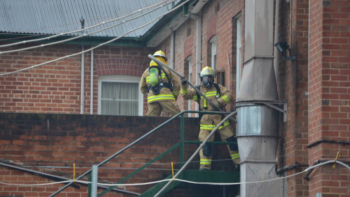 YASS: Patrons were evacuated from the Club House Hotel in Yass last Tuesday following a fire in one of the upstairs rooms. Photo YASS TRIBUNE.