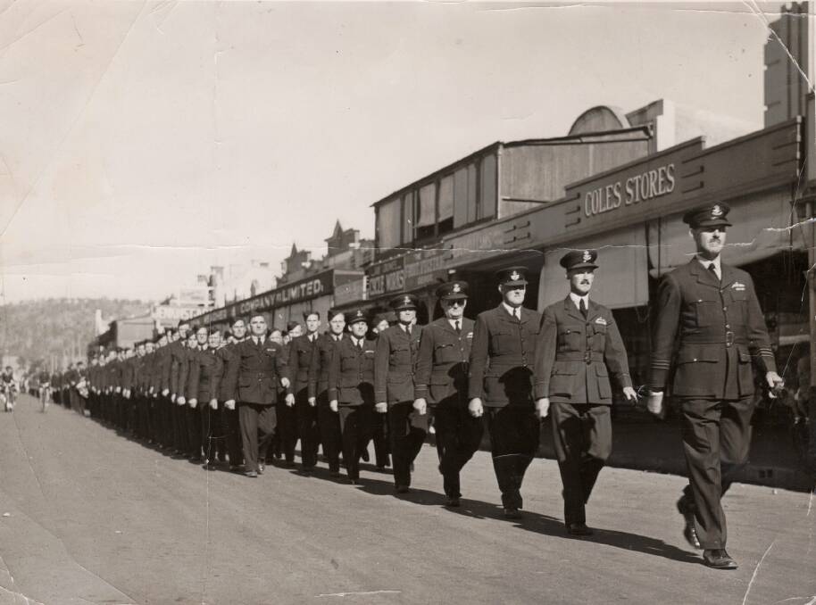 QUICK MARCH: Personnel from No 1 Air Observers School, Cootamundra, marching down the town’s main thoroughfare, Parker Street in 1941.
